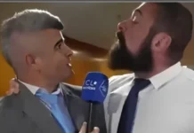 Deputado agarra Guga Noblat pelo pescoço durante entrevista na Câmara